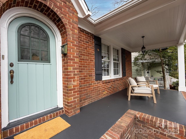 entrance to property with covered porch