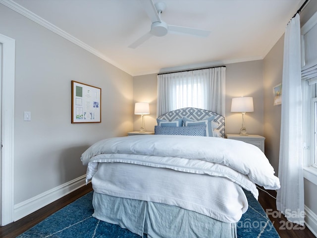 bedroom featuring crown molding, ceiling fan, and dark hardwood / wood-style flooring