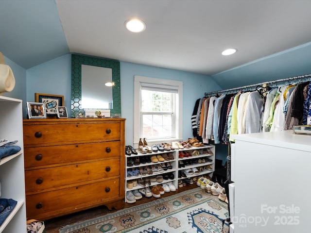 spacious closet featuring vaulted ceiling