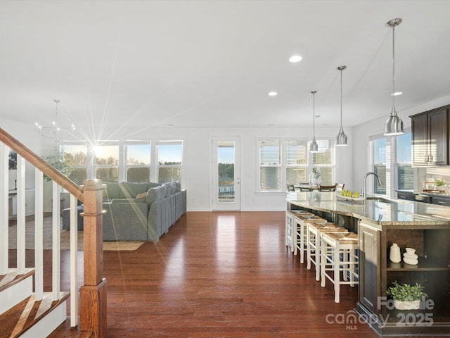 interior space featuring sink and dark wood-type flooring