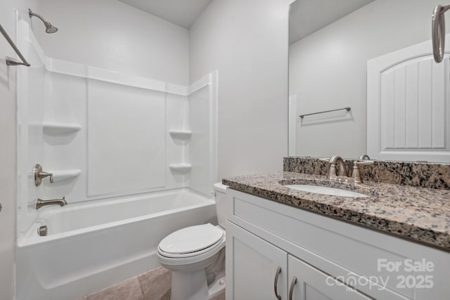 full bathroom with vanity, tub / shower combination, and toilet