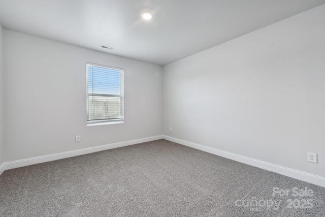 spare room with carpet flooring