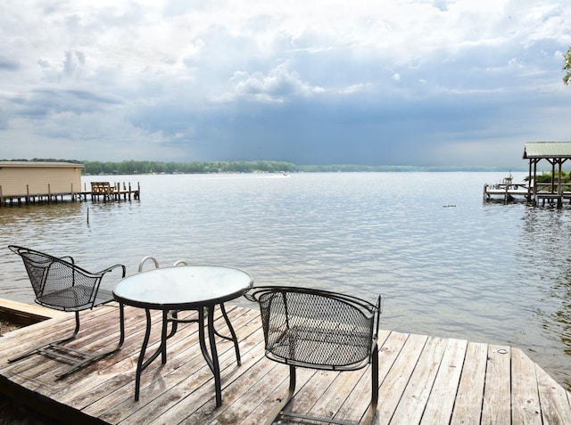 dock area with a water view