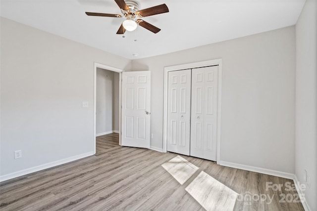 505 Kings Mountain St, Clover, SC 29710 - unfurnished bedroom with ceiling fan, light wood-type flooring, and a closet