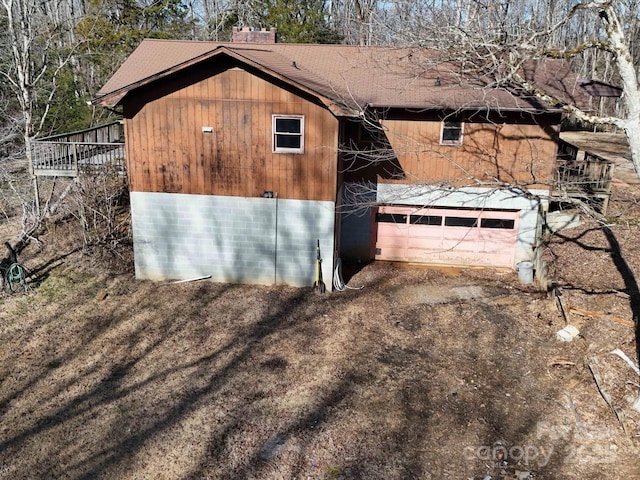 view of home's exterior with a garage