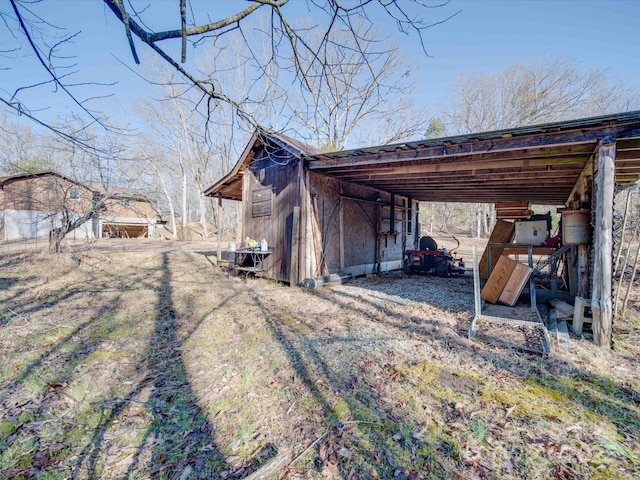 view of home's exterior featuring an outdoor structure