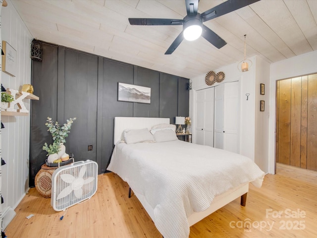 bedroom featuring ceiling fan and light wood-type flooring