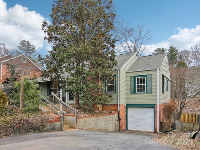 view of front of property featuring a garage