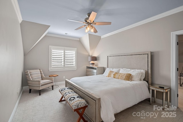 carpeted bedroom with baseboards, visible vents, a ceiling fan, and crown molding