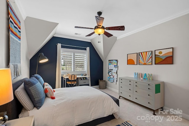 bedroom with ornamental molding, visible vents, vaulted ceiling, and carpet flooring