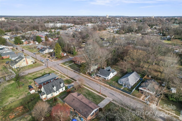 birds eye view of property with a residential view