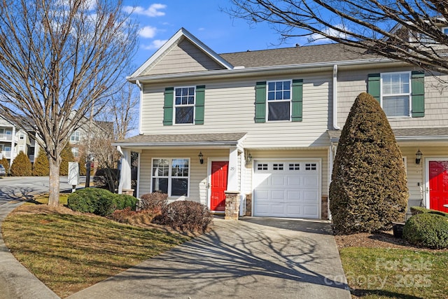 view of front of property with a garage