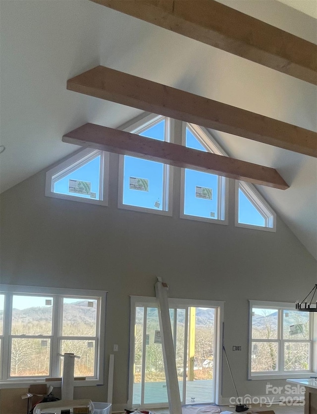 room details featuring beamed ceiling