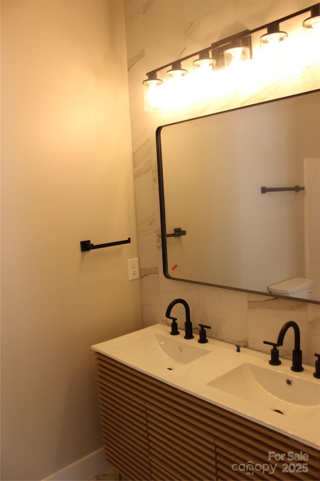 122 Chepstow Pl, Black Mountain, NC 28711 - full bathroom featuring double vanity and baseboards