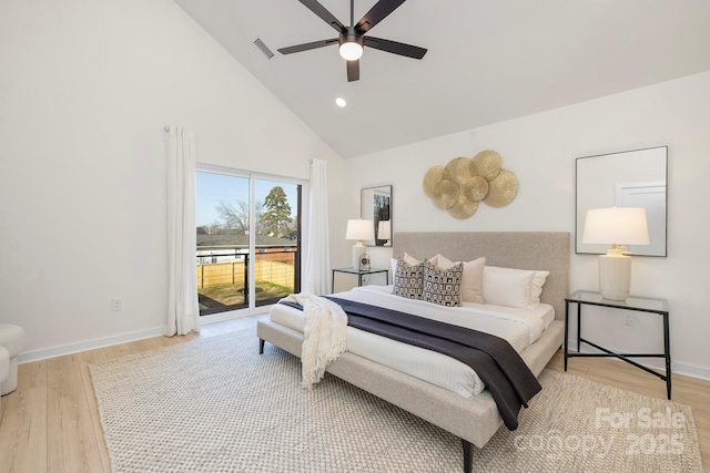 bedroom featuring ceiling fan, high vaulted ceiling, access to exterior, and light hardwood / wood-style floors