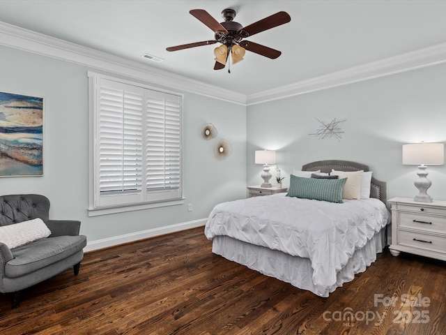 bedroom featuring crown molding, dark hardwood / wood-style floors, and ceiling fan