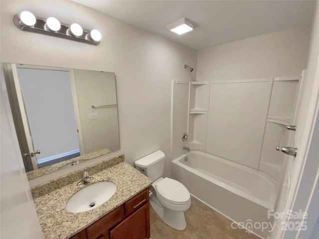 full bathroom featuring vanity, tile patterned floors, bathing tub / shower combination, and toilet