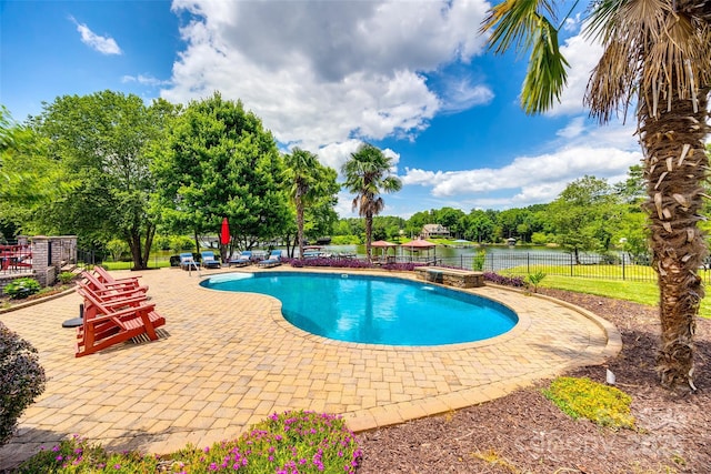 view of pool with a fenced in pool, a patio area, and fence