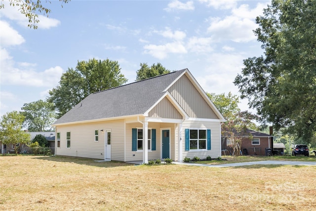 view of front of home with a front yard