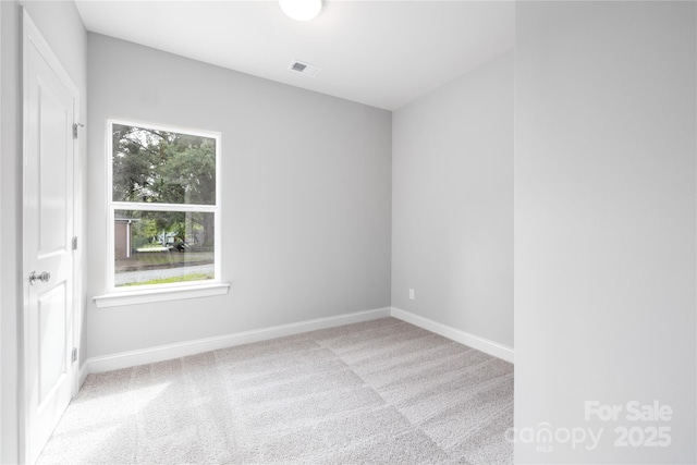 view of carpeted spare room