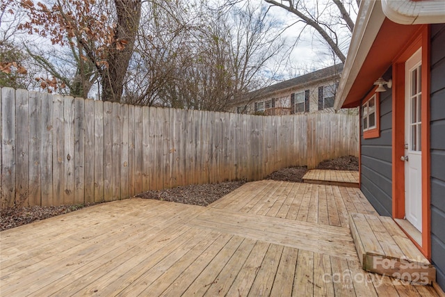 wooden deck featuring fence