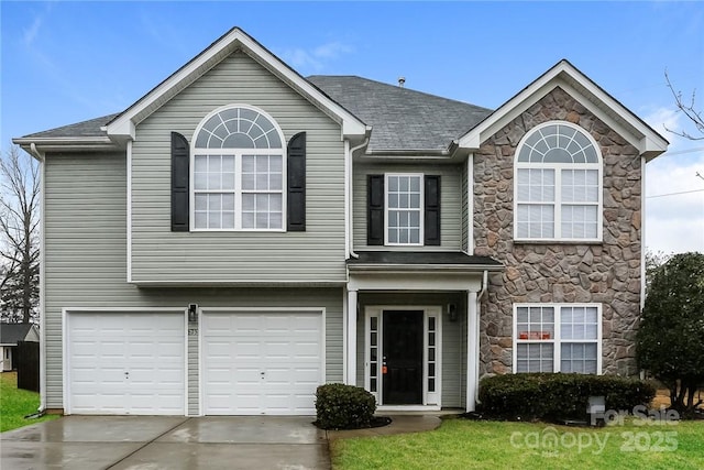 view of front of property with a garage