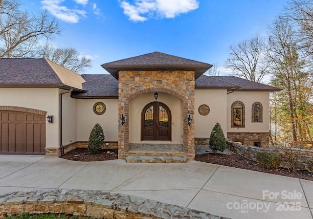 view of front of property with a garage