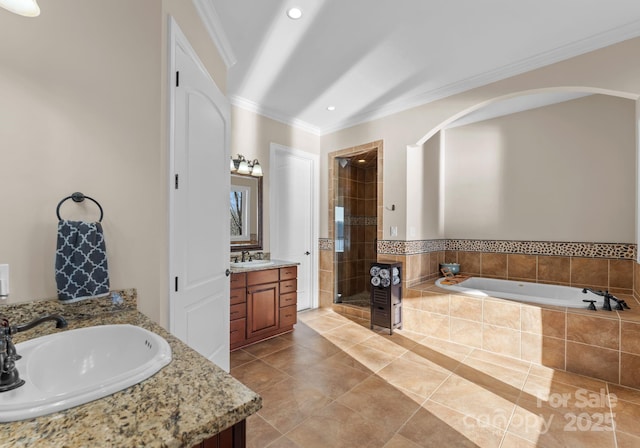 bathroom with crown molding, vanity, independent shower and bath, and tile patterned flooring