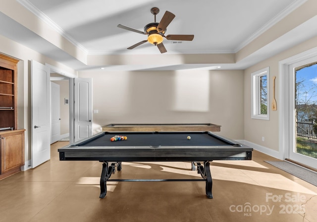 recreation room featuring a raised ceiling, ornamental molding, and pool table