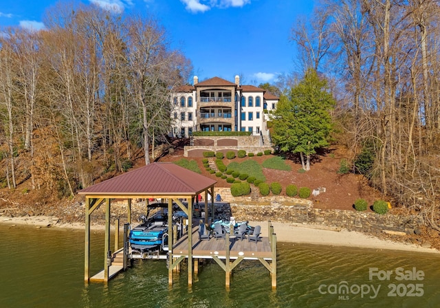 dock area featuring a water view and boat lift