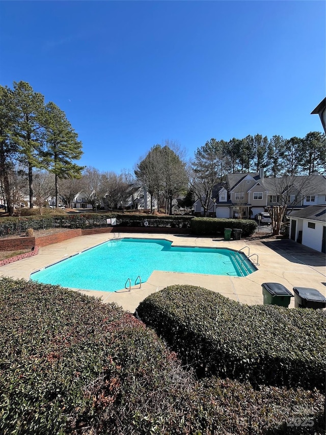 view of pool featuring a patio