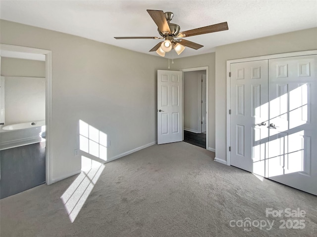 interior space with ceiling fan and light carpet