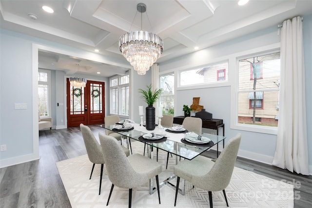 dining room featuring dark hardwood / wood-style floors and a chandelier