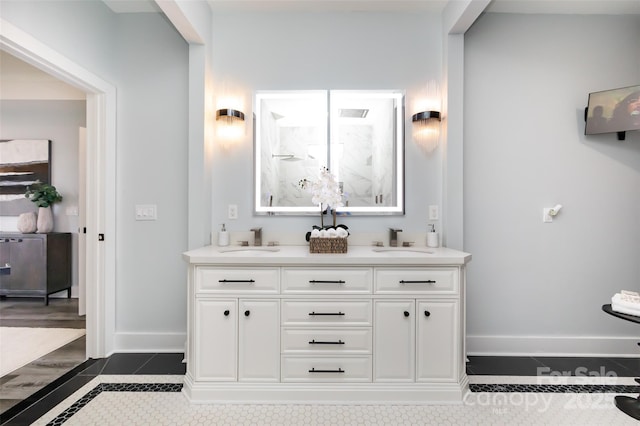 bathroom featuring vanity and tile patterned flooring