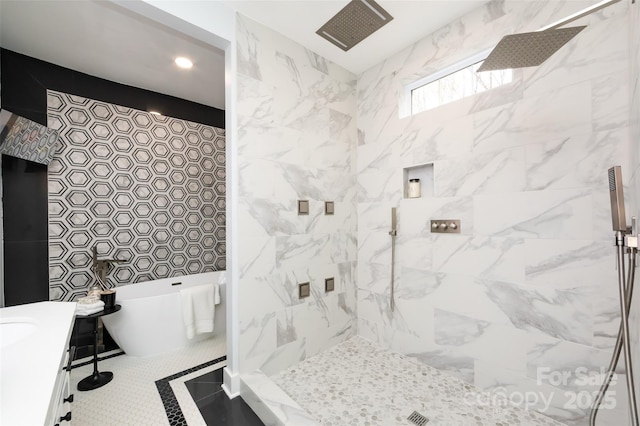 bathroom with vanity, tile patterned floors, and separate shower and tub