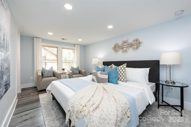 bedroom with wood-type flooring