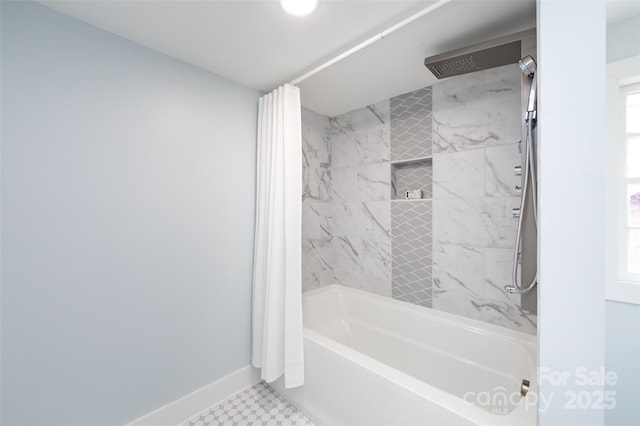 bathroom with shower / bath combo