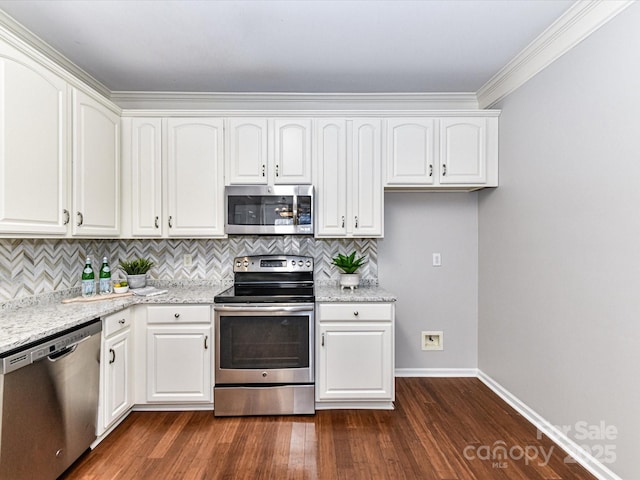 kitchen featuring appliances with stainless steel finishes, dark wood finished floors, light stone counters, and white cabinets