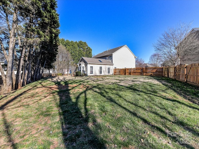 view of yard featuring a fenced backyard