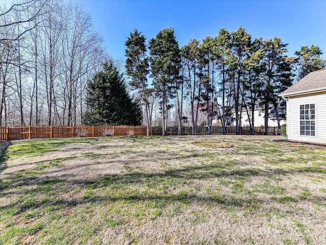 view of yard featuring a fenced backyard