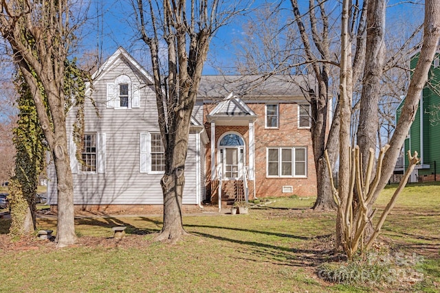 view of property with a front lawn