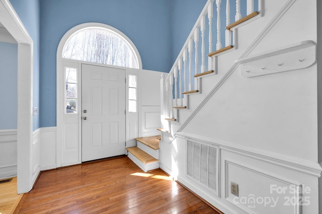 entrance foyer featuring hardwood / wood-style flooring