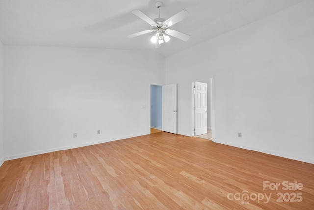 unfurnished room with high vaulted ceiling, light hardwood / wood-style floors, and ceiling fan