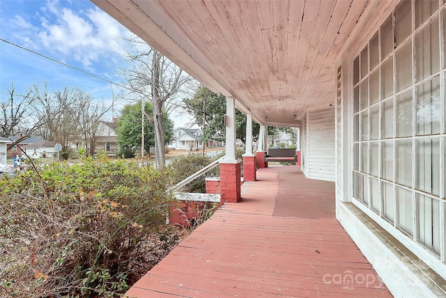 deck with covered porch