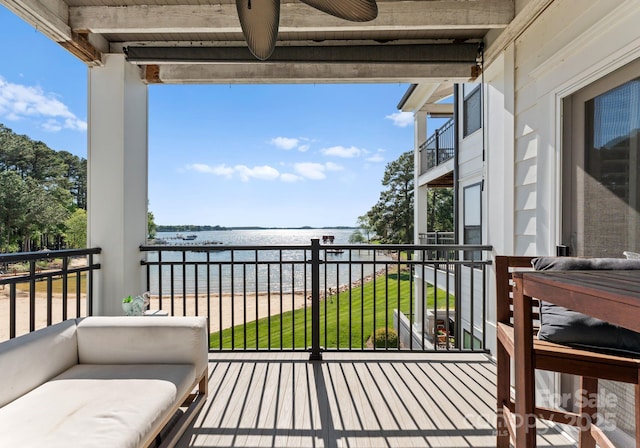 balcony featuring a water view