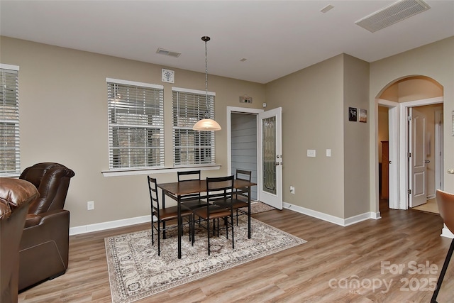 dining room featuring wood-type flooring