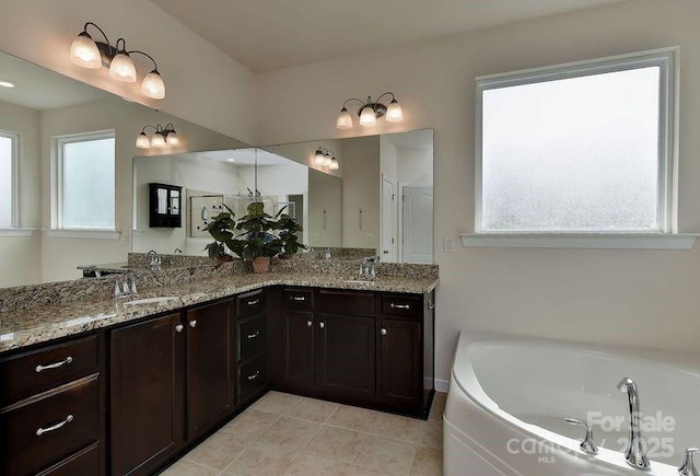 bathroom with vanity and tile patterned floors