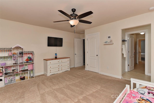 bedroom with light carpet and ceiling fan