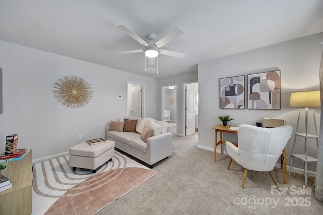 living room with ceiling fan and light colored carpet