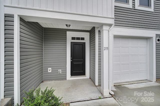 property entrance with a garage